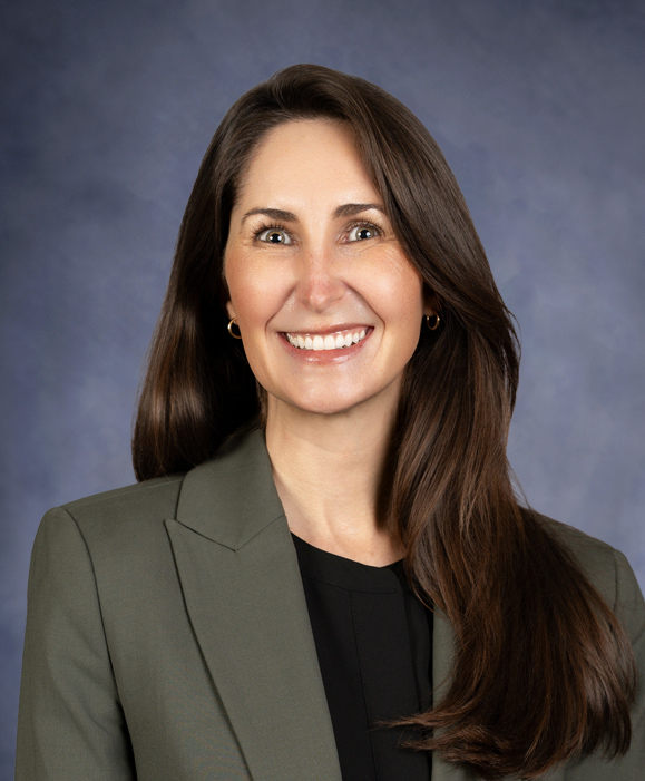 Portrait of QueensCare's Chief Strategy and Program Officer Emily Skehan